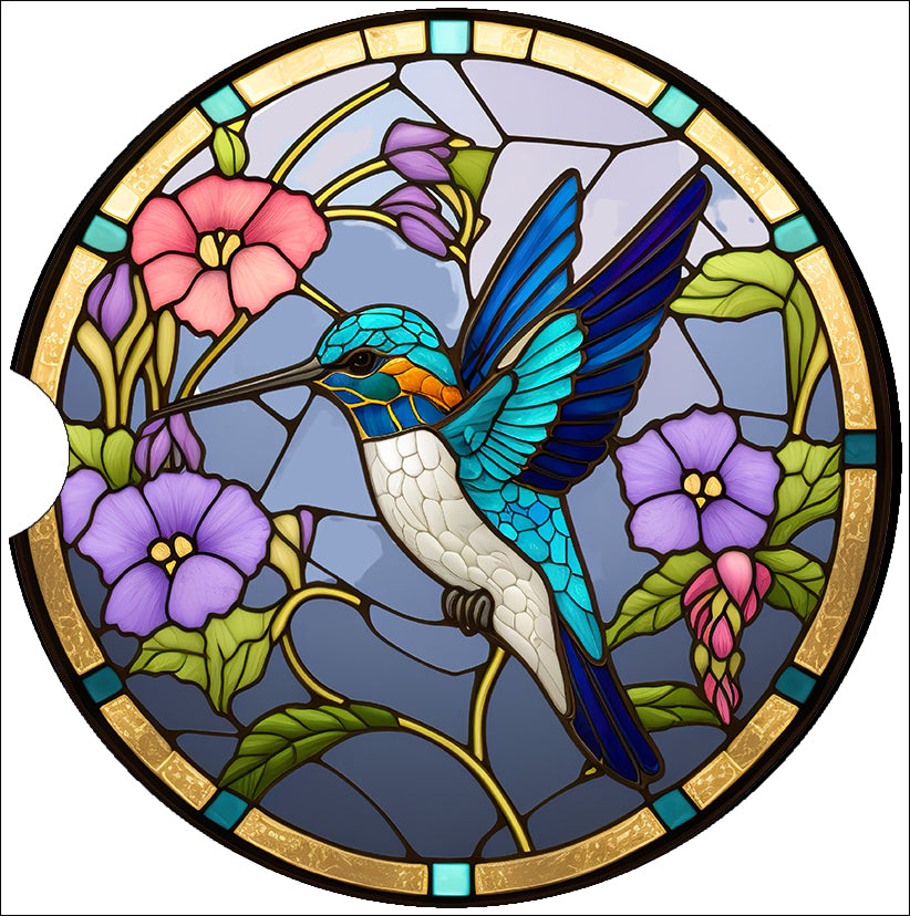 a stained glass window with a hummingbird and flowers